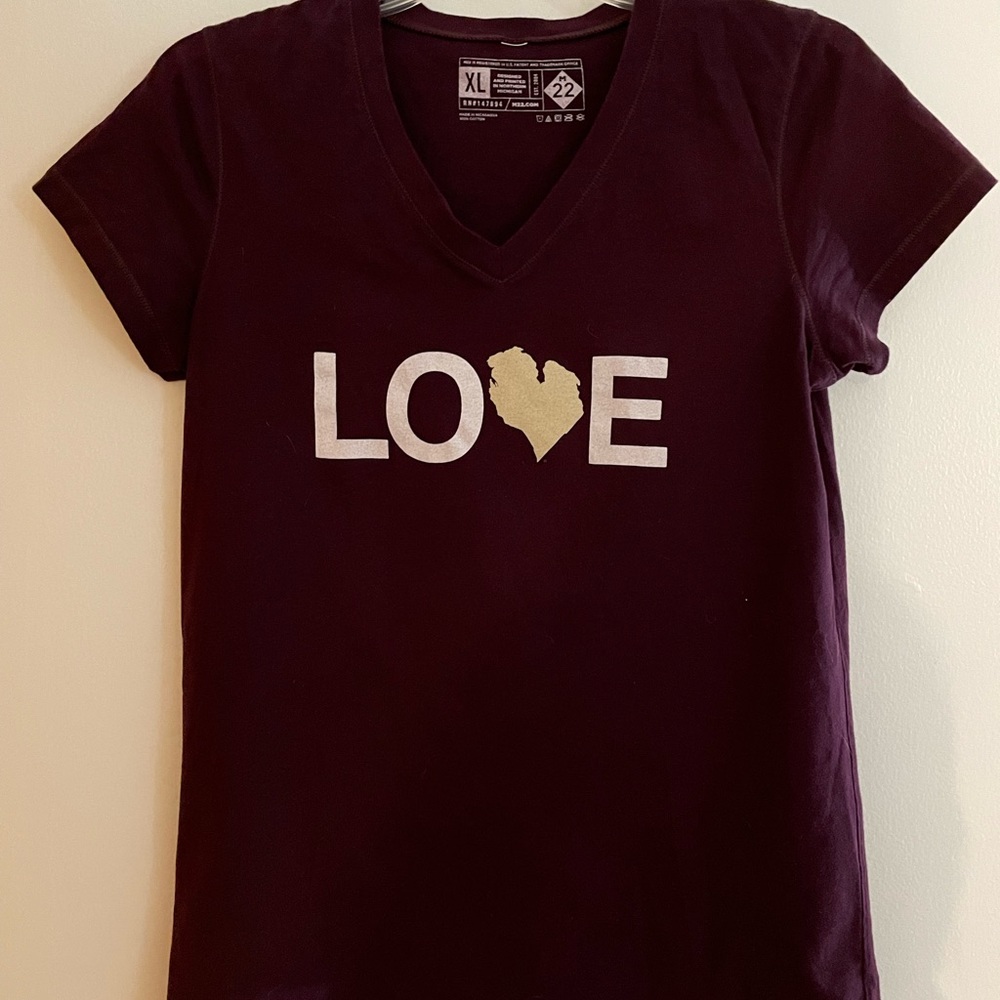 Womens burgundy V neck LOVE M22 t-shirt. LOVE on front & Michigan state on back